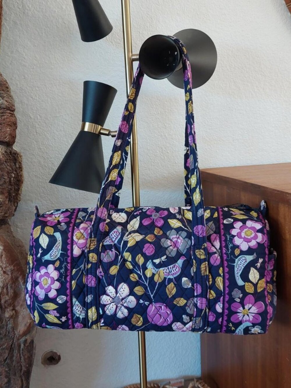 vera Bradley Floral Nightingale floral duffle bag with purple, pink, and yellow